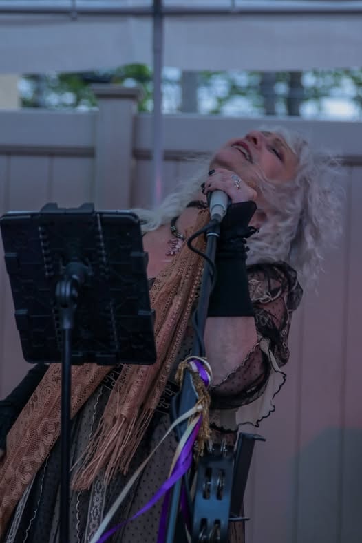 Female vocalist performing live